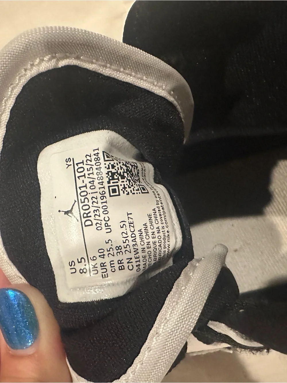 Nike Woman’s Black and White Low-Top Sneakers